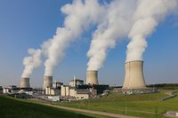 Cooling towers rise above the Cattenom nuclear power plant's four nuclear reactors