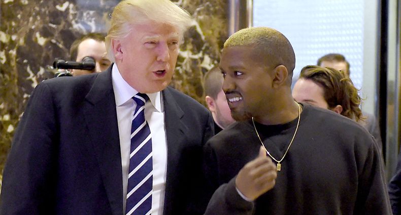 (FILES) In this file photo taken on December 13, 2016, singer Kanye West and President-elect Donald Trump arrive to speak with the press after their meetings at Trump Tower in New York. - The rapper and fashion designer Kanye West has suggested he will run for president and wants Donald Trump to be his running mate. Trump, for his part, brushed aside a recent meeting with West as of no significance. The artist, who goes by the name Ye, posted on November 24, 2022, a swirling symbol on his Twitter account with "Ye" and the number 24, apparently representing 2024, the year of the next US presidential election. (Photo by TIMOTHY A. CLARY / AFP)