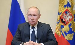 Russian President Vladimir Putin addresses the nation over the coronavirus outbreak at the Novo-Ogaryovo residence outside Moscow on March 25, 2020. (Photo by Alexei Druzhinin / SPUTNIK / AFP)