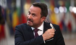 Luxembourg's Prime Minister Xavier Bettel gestures as he speaks upon arrival for a European Union Council in Brussels on July 17, 2020, as the leaders of the European Union hold their first face-to-face summit over a post-virus economic rescue plan. - The EU has been plunged into a historic economic crunch by the coronavirus crisis, and EU officials have drawn up plans for a huge stimulus package to lead their countries out of lockdown. (Photo by Francisco Seco / POOL / AFP)