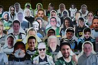 Cardboard cut-outs with portraits of Borussia Moenchegladbach's supporters are seen at the Borussia Park football stadium in Moenchengladbach, western Germany, on April 16, 2020, amid the novel coronavirus COVID-19 pandemic. - Large-scale public events such as football matches will remain banned in Germany until August 31 due to the coronavirus crisis, Berlin said on Wednesday, April 15, 2020, though it did not rule out allowing Bundesliga games to continue behind closed doors. (Photo by Ina FASSBENDER / AFP)