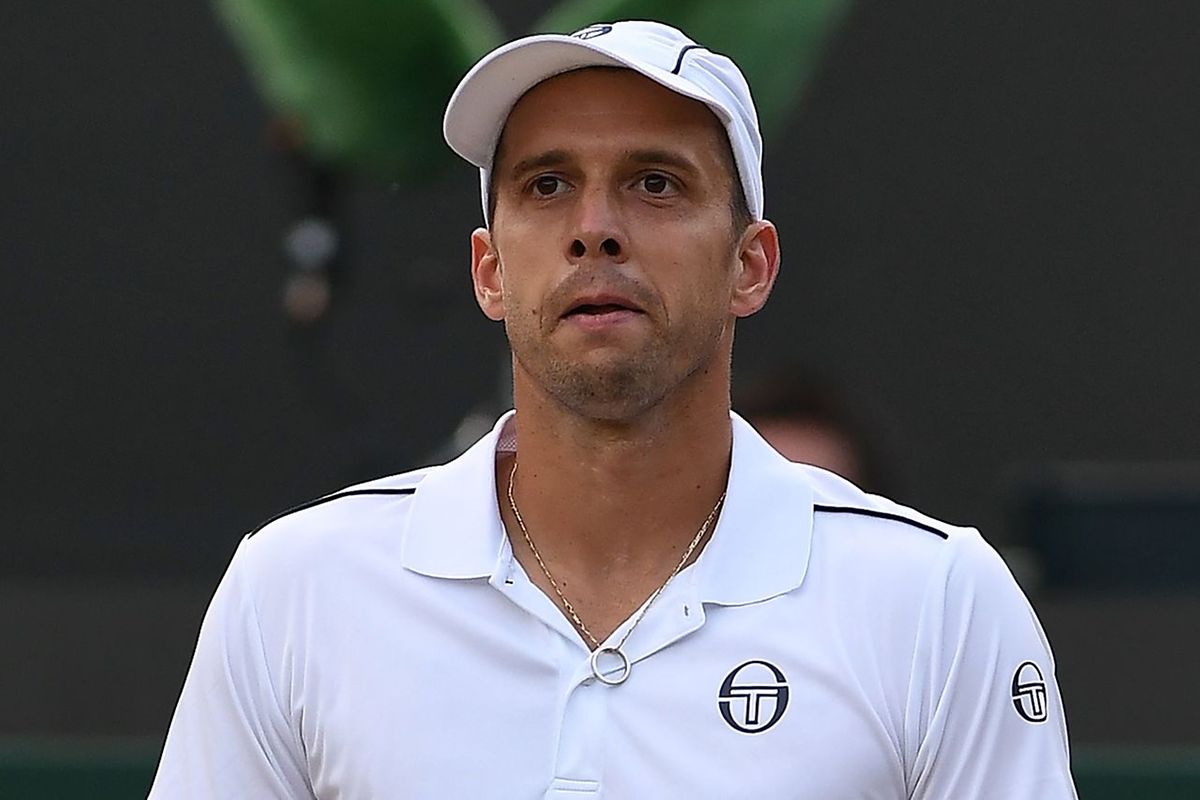 Luxembourg's Gilles Muller reacts after winning against Spain's Rafael Nadal during their men's singles fourth round match on the seventh day of the 2017 Wimbledon Championships at The All England Lawn Tennis Club in Wimbledon, southwest London, on July 10, 2017.
Muller won the match 6-3, 6-4, 3-6, 4-6, 15-13. / AFP PHOTO / Glyn KIRK / RESTRICTED TO EDITORIAL USE