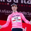 Team UAE Emirates rider Italy's Valerio Conti celebrates on the podium after taking the pink jersey of the overall leader at the end of the stage six of the 102nd Giro d'Italia - Tour of Italy - cycle race, 238kms from Cassino to San Giovanni Rotondo on May 16, 2019. (Photo by Luk BENIES / AFP)