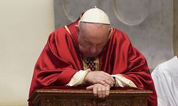 Pope Francis Pope Francis kneels during Good Friday Mass for the Passion of Christ, held behind closed doors at St. Peter's Basilica in the Vatican on April 10, 2020 during the lockdown aimed at stopping the spread of the COVID-19 pandemic, caused by the novel coronavirus. (Photo by Andrew Medichini / POOL / AFP)