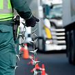Spanish Civil Guard officers stand guard in a checkpoint at the Spanish-Portuguese border between Tui and Valenca, on March 16, 2020. - Portugal will close its border with Spain to tourists for at least a month to curb the spread of coronavirus, Portuguese Prime Minister Antonio Costa said yesterday. Goods and people travelling for work will still be allowed to cross the border but not those on leisure trips, he told a news conference after speaking by videoconference with his Spanish counterpart Pedro Sanchez. (Photo by MIGUEL RIOPA / AFP)