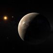 A hand out image made available by the European Southern Observatory on August 24 2016, shows an artist's impression of the planet Proxima b orbiting the red dwarf star Proxima Centauri