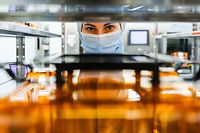 MOSCOW, RUSSIA - FEBRUARY 13, 2019: A worker in the photolithography section on a semiconductor plant of the Mikron Group in Zelenograd, Moscow; Mikron is Russia's largest manufacturer of semiconductors, including microprocessors for smart cards and IDs, and RFID tags. Anton Novoderezhkin/TASS (Photo by Anton Novoderezhkin\TASS via Getty Images)
