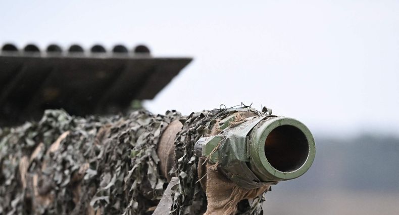 The barrel of a Leopard 2 cannon is seen at the training ground in Augustdorf, western Germany on February 1, 2023, during a visit of the German Defence Minister of the Bundeswehr Tank Battalion 203, to learn about the performance of the Leopard 2 main battle tank. (Photo by INA FASSBENDER / AFP)
