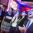 WASHINGTON, DC - NOVEMBER 06: People react to 2018 midterm election results during a DCCC election watch party at the Hyatt Regency on November 6, 2018 in Washington, DC. Today millions of Americans headed to the polls to vote in the midterm elections that will decide what party will control the House of Representatives and the U.S. Senate.   Zach Gibson/Getty Images/AFP
== FOR NEWSPAPERS, INTERNET, TELCOS & TELEVISION USE ONLY ==