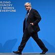 (FILES) In this file photo taken on October 03, 2017 Britain's then Foreign Secretary Boris Johnson arrives to deliver his speech on the third day of the Conservative Party annual conference at the Manchester Central Convention Centre in Manchester on October 3, 2017. - In a quiet summer week, a disparaging quip about the burqa by ex-foreign secretary Boris Johnson has sparked a frenzied debate in Britain drawing in religion, politics and Brexit. The former London mayor wrote a column in the Daily Telegraph newspaper on Monday saying the full Muslim face veil should not be banned but women who wear it look like "letter boxes" and "bank robbers". The comment prompted a frenzy of reaction, with campaigners accusing Johnson of encouraging Islamophobia. (Photo by Oli SCARFF / AFP)