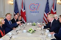 TOPSHOT - US President Donald Trump (2nd L) and Britain's Prime Minister Boris Johnson (2nd R) attend a working breakfast in Biarritz, south-west France on August 25, 2019, on the second day of the annual G7 Summit attended by the leaders of the world's seven richest democracies, Britain, Canada, France, Germany, Italy, Japan and the United States. (Photo by Nicholas Kamm / AFP)