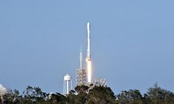 Space X's Falcon 9 rocket lifts off from space launch complex 39A at Kennedy Space Center, Florida on March 30, 2017, with an SES communications satellite.  
SpaceX blasted off a recycled rocket for the first time on, using a booster that had previously flown cargo to the astronauts living at the International Space Station. / AFP PHOTO / BRUCE WEAVER