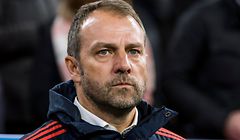 (FILES) In this file photo taken on December 11, 2019 Bayern Munich's German interim head coach Hans-Dieter Flick watches proceedings during the UEFA Champions League Group B football match between Bayern Munich v Tottenham FC in Munich, Germany. - Hansi Flick is to remain Bayern Munich coach until 'at least' the end of season, the club said on December 22, 2019. (Photo by Odd ANDERSEN / AFP)