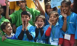 Indian school students shout slogans during a protest against global warming in New Delhi on March 15, 2019. (Photo by Prakash SINGH / AFP)