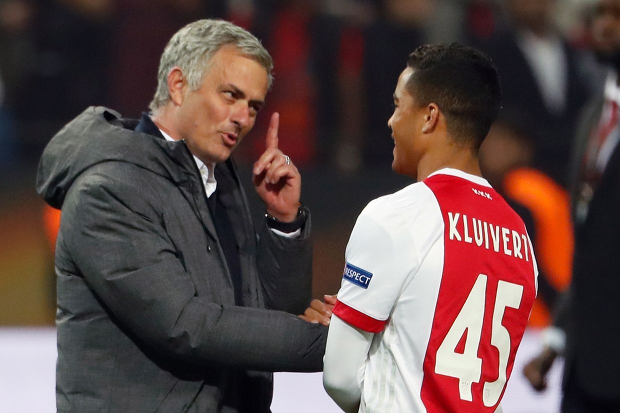 Manchester United's Portuguese manager Jose Mourinho (L) spaeks with Ajax Dutch forward Justin Kluivert after the UEFA Europa League final football match Ajax Amsterdam v Manchester United on May 24, 2017 at the Friends Arena in Solna outside Stockholm. / AFP PHOTO / Odd ANDERSEN
