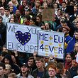 Demonstrators hold up Pro-Europe placards at an anti-Brexit protest in Trafalgar Square in central London on June 28, 2016.