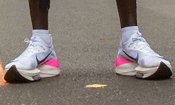 (FILES) This file photograph taken on October 12, 2019, shows the running shoes of Kenya's Eliud Kipchoge as he stands after his attempt to break the two-hour barrier for the marathon at The Reichsbr�cke in Vienna, - The suspicion that World Athletics could ban Nike's Vaporfly shoes over fears they give runners an unfair edge gave a boost to the performance of some rivals. A World Athletics spokeswoman said January 16, 2020, that a committee composed of officials, athletes, doctors, scientists and legal experts, was still looking at the shoes, which athletes have worn to set a string of records in recent months, but is expected to make recommendations by the end of January. "The panel is still deliberating but we hope to be able to make an announcement by the end of the month," the spokeswoman told AFP, adding that any changes to the rules would then have to be approved by the International Federation Council. (Photo by ALEX HALADA / AFP)
