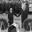 Historical gesture: French president Francois Mitterand (l) and chancellor Helmut Kohl reach out their hands to each other above the graves of Verdun on the 22nd of September in 1984.