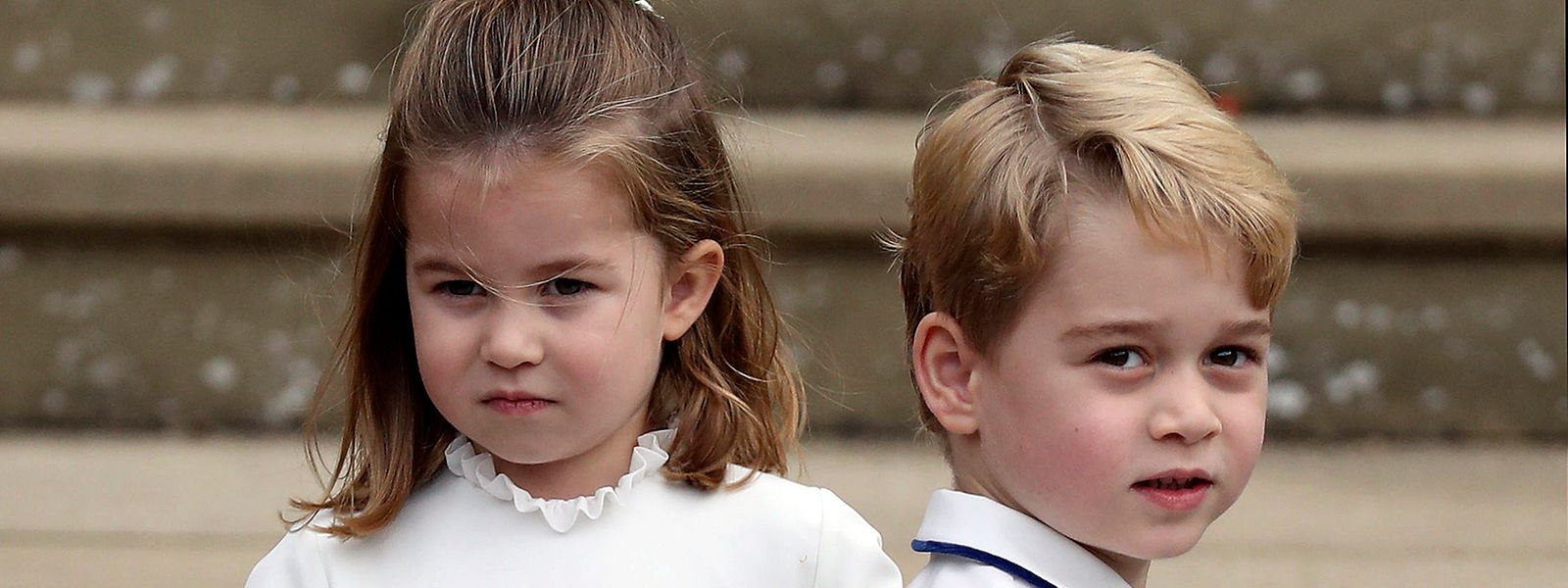 2018: Prinzessin Charlotte und Prinz George kommen zur Hochzeit von Prinzessin Eugenie in der St.-Georges-Kapelle von Schloss Windsor.