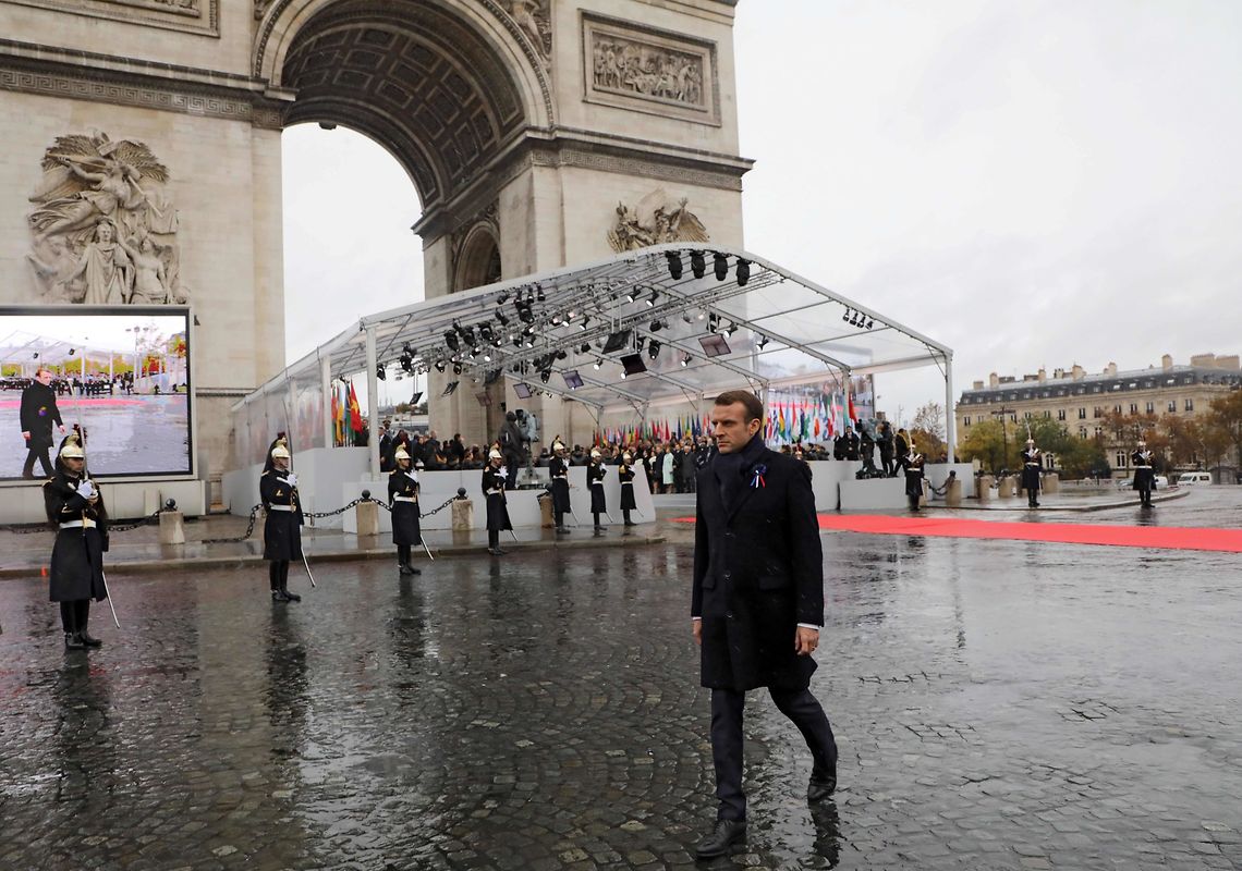 French President Emmanuel Macron arrives to take part in a ceremony at the Arc de Triomphe in Paris on November 11, 2018 as part of commemorations marking the 100th anniversary of the 11 November 1918 armistice, ending World War I. (Photo by ludovic MARIN / POOL / AFP)