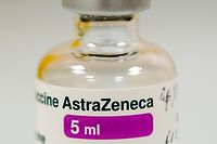 (FILES) In this file photo taken on January 4, 2021 a vial of the AstraZeneca/Oxford Covid-19 vaccine is pictured at the Lochee Health Centre in Dundee. - The EU's medicines regulator on January 29, 2021 recommended the authorisation of the AstraZeneca coronavirus vaccine for all people over the age of 18, saying it believed the jab was also suitable for older people. (Photo by Andy Buchanan / POOL / AFP)