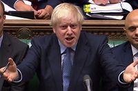 A video grab from footage broadcast by the UK Parliament's Parliamentary Recording Unit (PRU) shows Britain's Prime Minister Boris Johnson reacting as the opposition Labour Party leader Jeremy Corbyn speaks during Prime Ministers Questions (PMQs) session in the House of Commons in London on September 4, 2019. - Prime Minister Boris Johnson headed into a fresh Brexit showdown in parliament on Wednesday after being dealt a stinging defeat over his promise to get Britain out of the EU at any cost next month. (Photo by - / PRU / AFP) / RESTRICTED TO EDITORIAL USE - MANDATORY CREDIT " AFP PHOTO / PRU " - NO USE FOR ENTERTAINMENT, SATIRICAL, MARKETING OR ADVERTISING CAMPAIGNS - EDITORS NOTE THE IMAGE HAS BEEN DIGITALLY ALTERED AT SOURCE TO OBSCURE VISIBLE DOCUMENTS