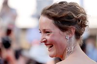 Luxembourg actress Vicky Krieps arrives for the screening of the film "Serre-moi Fort" (Hold Me Tight) at the 74th edition of the Cannes Film Festival in Cannes, southern France, on July 14, 2021. (Photo by Valery HACHE / AFP)