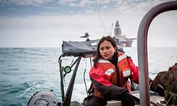 Activist Joanna Sustento in the Barents Sea.

11 peaceful activists from the Greenpeace ship Arctic Sunrise have taken to the water in inflatable boats with handheld banners to oppose Statoil Songa Enabler oil rig, 275 km North of the Norwegian coast, in the Arctic Barents sea.

Climate change survivor and activist Joanna Sustento from the Philippines, and actress and activist Lucy Lawless from New Zealand, are among the 19 nationalities who have travelled to the high Northern waters onboard the Arctic Sunrise. Sustento wants the Norwegian government to take responsibility for its climate commitments and development of a new oil frontier in the Arctic. She lost her entire family, except for her brother, to Super-typhoon Haiyan in 2013 which left large parts of her hometown, Tacloban, in ruins.