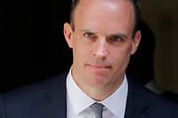 Britain's new Secretary of State for Exiting the European Union (Brexit Minister) Dominic Raab leaves 10 Downing Street in central London on July 9, 2018 following his appointment. 
Raab, formerly a junior house minister, was appointed as Britain's new Brexit minister after the resignation of David Davis. British Prime Minister Theresa May faced a crisis in her cabinet on July 9 after Brexit minister David Davis and one of his deputies resigned over a plan to retain strong economic ties to the EU even after leaving the bloc. / AFP PHOTO / Tolga AKMEN