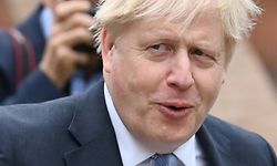 Britain's Prime Minister Boris Johnson is seen on the third day of the annual Conservative Party Conference being held at the Manchester Central convention centre in Manchester, northwest England, on October 5, 2021. (Photo by Paul ELLIS / AFP)