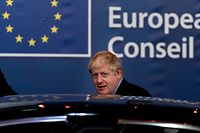 British Prime Minister Boris Johnson leaves an European Union Summit at European Union Headquarters in Brussels on October 18, 2019. (Photo by Kenzo TRIBOUILLARD / AFP)
