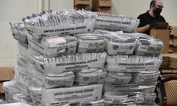 TOPSHOT - Mail-in ballots in their envelopes await processing at the Los Angeles County Registrar Recorders' mail-in ballot processing center at the Pomona Fairplex in Pomona, California, October 28, 2020. - Officials relocated mail-in ballot processing to the expansive location due to the need for COVID-19 social distancing for the ballot workers and the large number of mail-in ballots. While the tabulation of votes cast for Donald Trump and Joe Biden will begin when polls close on November 3 at 8pm, envelopes are now being sorted and signatures and ballots verified to expedite the tabulation process on November 3. (Photo by Robyn Beck / AFP)