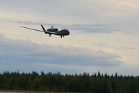In this image released by the US Air Force, a RQ-4 Global Hawk unmanned surveillance drone lands on August 16, 2018, at Eielson Air Force Base, Alaska. - The Pentagon confirmed on June 20, 2019, that Iranian forces shot down a US naval surveillance drone but insisted the aircraft was in international air space, not that of Iran. The RQ-4A Global Hawk drone was downed by an Iranian surface-to-air missile system while flying in international airspace over the Strait of Hormuz, a US Central Command spokesman, Navy Captain Bill Urban, said in a statement. He said it happened at 23h35GMT, June 19. (Photo by Tristan D. Viglianco / US AIR FORCE / AFP) / RESTRICTED TO EDITORIAL USE - MANDATORY CREDIT "AFP PHOTO / US Air Force / Airman 1st Class Tristan D. Viglianco" - NO MARKETING NO ADVERTISING CAMPAIGNS - DISTRIBUTED AS A SERVICE TO CLIENTS