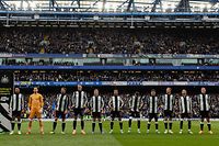 LONDON, ENGLAND - MARCH 13: Players and officials line up during the Premier League match between Chelsea and Newcastle United at Stamford Bridge on March 13, 2022 in London, England. (Photo by Serena Taylor/Newcastle United via Getty Images)