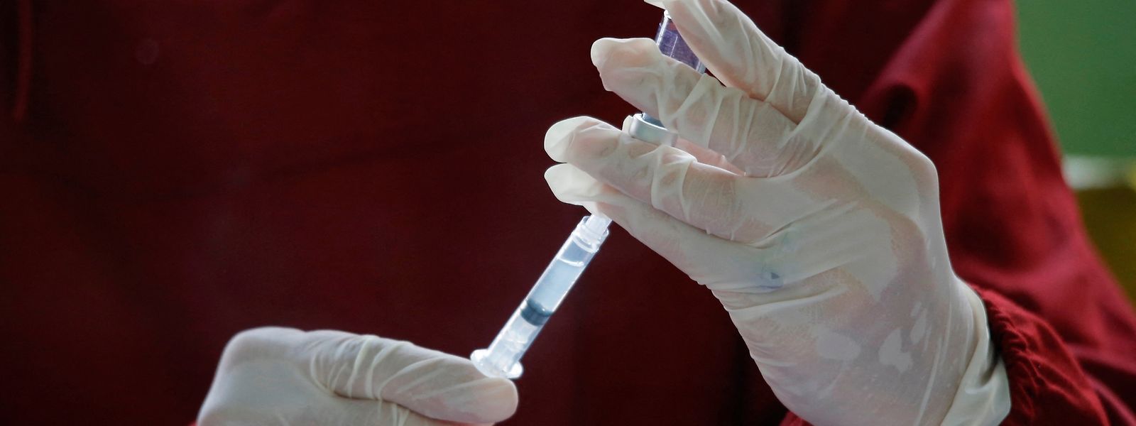 A nurse prepares the Sinovac COVID-19 coronavirus vaccine in Bandar Lampung, Lampung province on September 3, 2021. (Photo by PERDIANSYAH / AFP)
