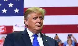 US President Donald Trump arrives at a "Make America Great Again" rally at Landers Center in Southaven, Mississippi, on October 2, 2018. (Photo by MANDEL NGAN / AFP)