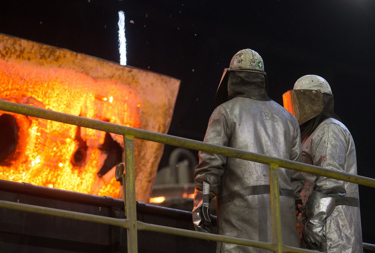 Workers at the former ArcelorMittal steel mill in Belval in December 2016