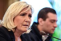 France's far-right party Rassemblement National (RN) president Marine Le Pen (L) and RN's front runner candidate for the European elections Jordan Bardella (R) address a press conference on May 18, 2019 in Milan where they came to attend a rally gathering leaders of 12 far-right parties marching seeking to forge a united front ahead of European elections. (Photo by Miguel MEDINA / AFP)