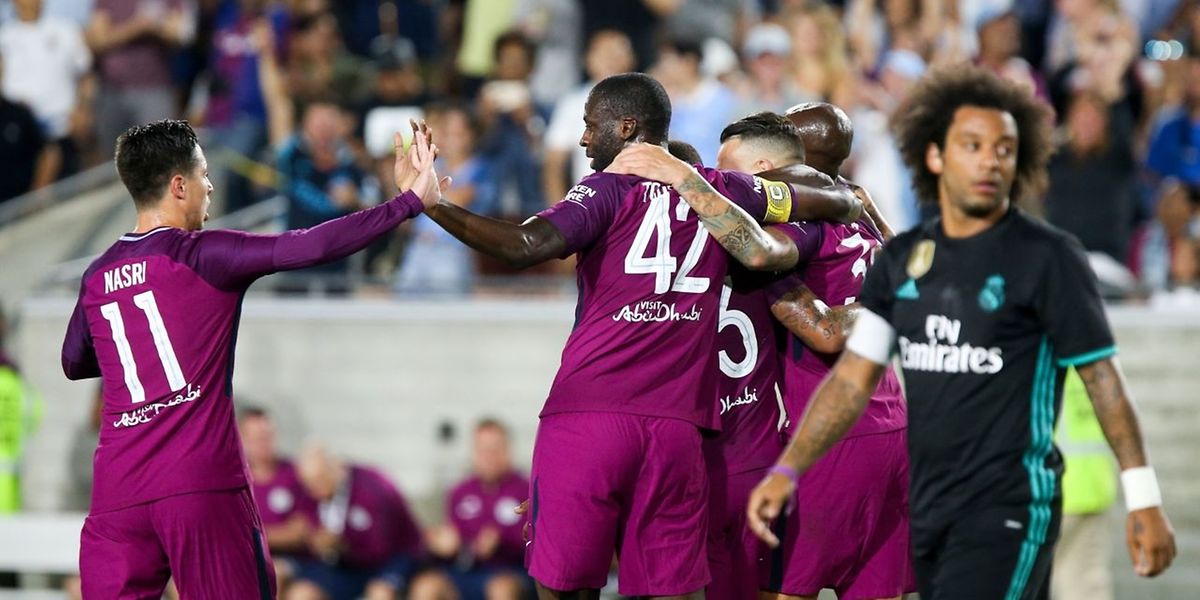 O jogadores do Manchester City celebram um dos golos frente ao Real Madrid
