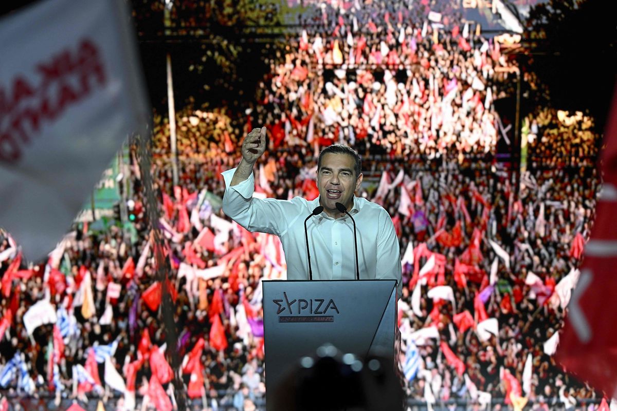 Leader of the leftist Syriza party Alexis Tsipras delivers a speech during the party's main campaign rally in Athens on May 18, 2023