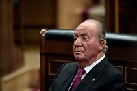(FILES) In this file photo taken on December 6, 2018 Spain's former King Juan Carlos attends commemorative acts marking the 40th anniversary of the Spanish Constitution at the parliament in Madrid. - Spain's scandal-hit former king Juan Carlos I, who now lives in exile, has settled a debt of nearly 4.4 million euros ($5.4 million) with the Spanish tax authorities, his lawyer said on February 26, 2021. The back taxes were due on the value of private jet flights that were paid by a foundation based in Liechtenstein belonging to a distant cousin that are considered taxable income. (Photo by OSCAR DEL POZO / AFP)