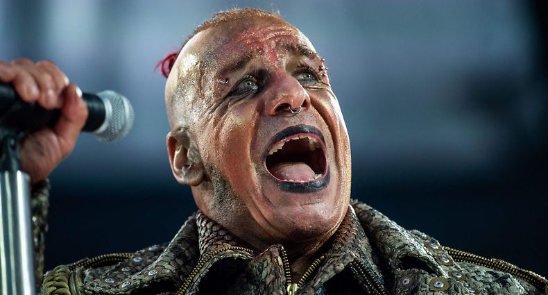 (FILES) Till Lindemann, lead vocalist of the band Rammstein, performs on stage of the HDI-Arena stadium in Hanover, northern Germany, during a concert of the band's "Europa Stadion Tour" on July 2, 2019. Germany's families minister has called for better protection for fans at concerts amid a wave of sexual assault allegations against the frontman of veteran rock band Rammstein. Several women have come forward in recent days to accuse Till Lindemann, 60, of grooming and sexually assaulting them at after-show parties. (Photo by Christophe Gateau / DPA / AFP) / Germany OUT / RESTRICTED TO EDITORIAL USE IN CONNECTION WITH REPORTS OF RAMMSTEIN'S EUROPA STADION TOUR 2019