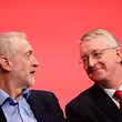 (FILES) This file photo taken on September 28, 2015 shows British opposition Labour Party Leader Jeremy Corbyn (L) as he speaks with with Shadow Foreign Secretary Hilary Benn on day two of the annual Labour party conference in Brighton, southern England.
The future of opposition Labour leader Jeremy Corbyn looked shaky on June 26, 2016, after two members of his top team quit and others seemed set to follow over his handling of Britain's EU referendum. Corbyn sacked his foreign affairs spokesman, Hilary Benn, late Saturday after Benn said he no longer had confidence in his leadership, while health spokeswoman Heidi Alexander announced her resignation on Twitter Sunday. / AFP PHOTO / Leon NEAL