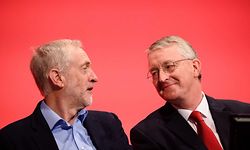 (FILES) This file photo taken on September 28, 2015 shows British opposition Labour Party Leader Jeremy Corbyn (L) as he speaks with with Shadow Foreign Secretary Hilary Benn on day two of the annual Labour party conference in Brighton, southern England.
The future of opposition Labour leader Jeremy Corbyn looked shaky on June 26, 2016, after two members of his top team quit and others seemed set to follow over his handling of Britain's EU referendum. Corbyn sacked his foreign affairs spokesman, Hilary Benn, late Saturday after Benn said he no longer had confidence in his leadership, while health spokeswoman Heidi Alexander announced her resignation on Twitter Sunday. / AFP PHOTO / Leon NEAL