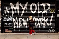 NEW YORK, NY - APRIL 16: A person walks by a closed business on April 16, 2020, in New York City. New York State Governor Andrew Cuomo announced during his daily COVID-19 briefing that the "New York State on PAUSE" order will be extended until May 15, and shared plans to allow business to reopen in what he is calling a phased priority scale based on the risks posed.   David Dee Delgado/Getty Images/AFP
== FOR NEWSPAPERS, INTERNET, TELCOS & TELEVISION USE ONLY ==