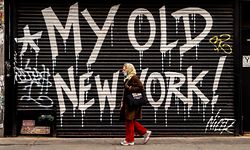 NEW YORK, NY - APRIL 16: A person walks by a closed business on April 16, 2020, in New York City. New York State Governor Andrew Cuomo announced during his daily COVID-19 briefing that the "New York State on PAUSE" order will be extended until May 15, and shared plans to allow business to reopen in what he is calling a phased priority scale based on the risks posed.   David Dee Delgado/Getty Images/AFP
== FOR NEWSPAPERS, INTERNET, TELCOS & TELEVISION USE ONLY ==