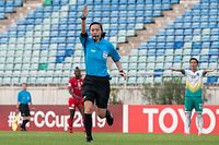 (FILES) In this file photo taken on May 15, 2019, Japanese referee Yoshimi Yamashita gestures during the AFC Cup football match between Myanmar�s Yangon United and Cambodia's Naga World at the Thuwunna Stadium in Yangon. (Photo by Sai Aung MAIN / AFP)