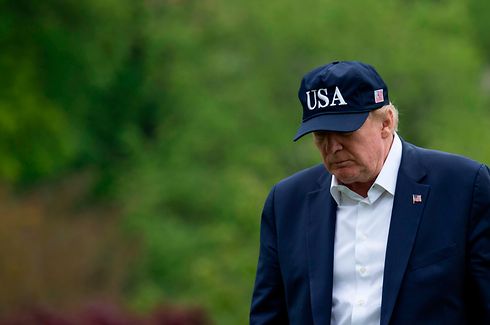 US President Donald Trump walks from Marine One to the White House on May 3, 2020 in Washington, DC after returning from Camp David. - Donald Trump will wrap himself in the mantle of America's arguably greatest president with a television extravaganza later Sunday at the Lincoln Memorial meant to leave the coronavirus crisis behind and relaunch his election campaign. (Photo by Andrew CABALLERO-REYNOLDS / AFP)