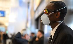 Limousine driver Eugenio Stewart, 46, awaits the arrival of a passenger coming from Rome, Italy, one of the last flights into the US before the start of the travel ban for passengers arriving from certain European countries, March 13, 2020, in the international terminal at Los Angeles International. - The new coronavirus isn't picky about who it infects -- so why does data emerging from some states suggest that African Americans are bearing the brunt?
Experts say the community is disproportionately impacted by underlying conditions linked to poverty, and often faces challenges in accessing testing and health care (Photo by Robyn Beck / AFP)