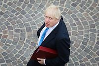 British Prime Minister Boris Johnson walks towards his meeting in Biarritz, south-west France on August 26, 2019, on the third day of the annual G7 Summit attended by the leaders of the world's seven richest democracies, Britain, Canada, France, Germany, Italy, Japan and the United States. (Photo by LUDOVIC MARIN / AFP)